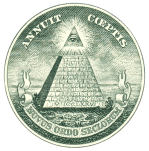 close-up of the US dollar bill showing an eye on top of a pyramid 