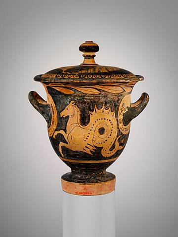 A vase with a dragon looking creature, but looking closer, it's a horse upper body, swirly dragon like lower body, and a fish tail